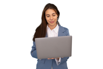 Young businesswoman smiling while holding a laptop, working confidently against a transparent background, embodying modern professionalism