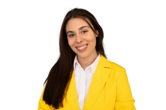 Capturing a cheerful businesswoman radiating confidence and professionalism while wearing a stylish yellow jacket over a white shirt