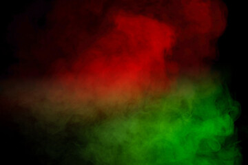 Green and white steam on a black background.