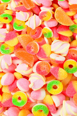 Assorted gummy candies. Top view.