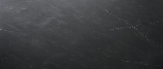 Black soapstone slab with natural veining and honed finish texture