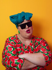 Cool plus size woman crossing arms with sunglasses
