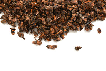 Obraz premium Whole Organic Star Anise. Aromatic Spice Closeup.Star Anise Pods. Natural Dried Spice on White Background. Star Anise Macro. Top View of Dried Star Anise. High-Resolution Stock Image. 