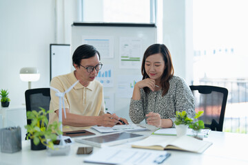 Business team brainstorming new ideas for sustainable energy innovation and green future...