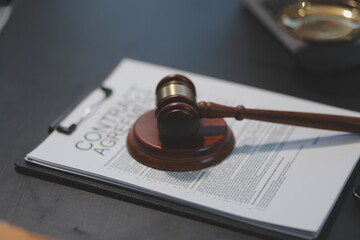 female business woman lawyers working at the law firms. Judge gavel with scales of justice. Legal law, lawyer, documents, advice and justice concept.