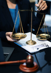 female business woman lawyers working at the law firms. Judge gavel with scales of justice. Legal law, lawyer, documents, advice and justice concept.
