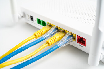 Ethernet cable with wireless router connect to internet service provider internet network.