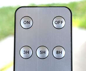 close up image of remote control for electronic device