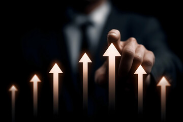 A businessman in a suit points to ascending arrows symbolizing growth, progress, and success in a dark, professional setting.