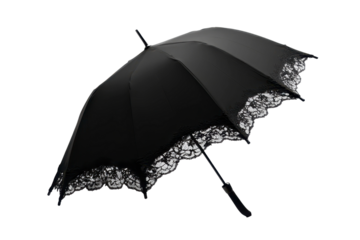 Elegant black umbrella with lace trim isolated on black background