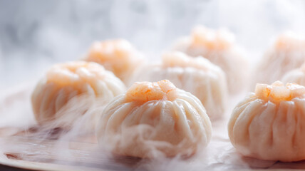 Frozen shrimp dumplings arranged for steaming