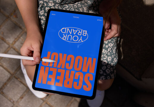 Blank Tablet Mockup With Stylus in Hand. . Screen mockup ready to use