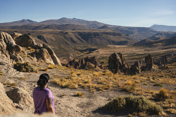 Woman at the unique rock formations of Los Bolillos, Neuquen, Argentina