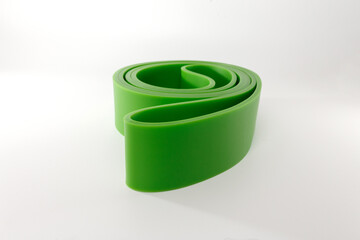 Green fitness bands rolled for packaging presentation useful for online sport accessories shops and e-commerce fitness platforms, Elastic Belt Pull-Up Auxiliary Gym Rubber Fitness Resistance Belt,