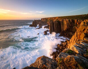 Naklejka premium Ocean Waves Hitting Rocky Shoreline at Sunset Nature Sea view