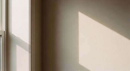 Interior Wall with Window Light Creating Shadow Patterns for Minimalist Design
