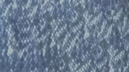 Abstract blue and white speckled texture background
