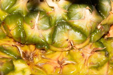 Close up of pieapple fruit skin on white background