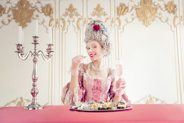 Elegant woman in vintage baroque attire enjoys a lavish meal inside a beautifully decorated palace