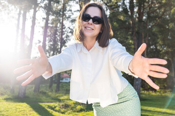 happy young woman showing thumbs up