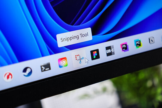 Poznan, Poland - June 6, 2025: Digital computer screen displaying the Snipping Tool application icon with a mouse cursor, illustrating modern screen capture functionality