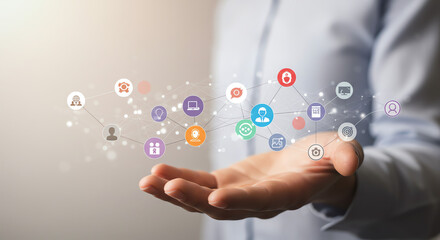 Hand holding digital network icons