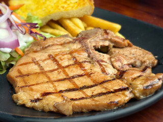 Pork steak with vegetable salad for dinner