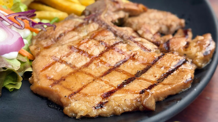 Pork steak with vegetable salad for dinner