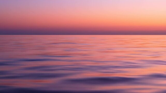 Serene Sunset Over Calm Ocean Water with Vibrant Colors and Gentle Waves for Relaxation and Nature Beauty Scene