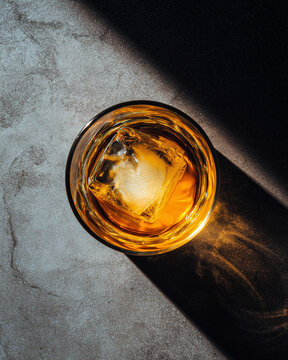 Old fashioned Whiskey cocktail drink, dark and moody