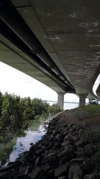 Sunlight Caustics Under Coastal Concrete Bridge