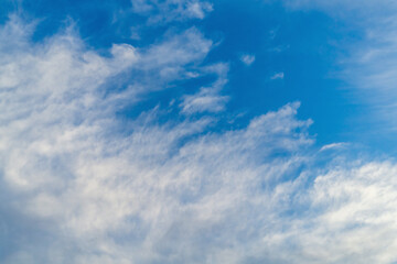 Blurred Photo Background is a wallpaper for mounting the background of a blue sky with dissipating clouds around the edges. Blank for artwork. Natural surroundings, weather changing