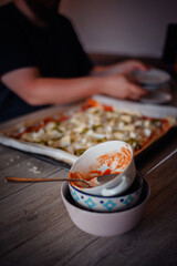 Stacked Used Bowls in Kitchen After Pizza Preparation