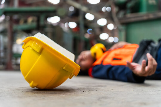 Accident in warehouse. An emergency occurred during the factory operation resulting in injuries. Safety and security in factory industry.