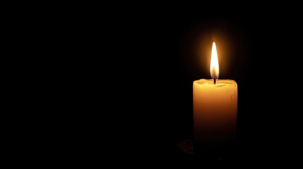 Single candle flickering on empty table symbolizing peaceful end of beautiful comforting thing, dark background emphasizing glow.