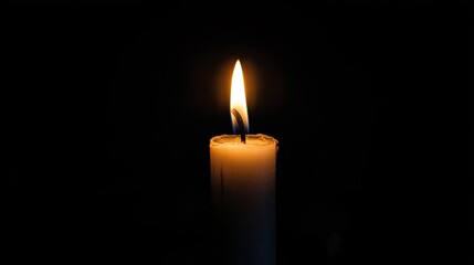 Single candle flickering on empty table symbolizing peaceful end of beautiful comforting thing, dark background emphasizing glow.