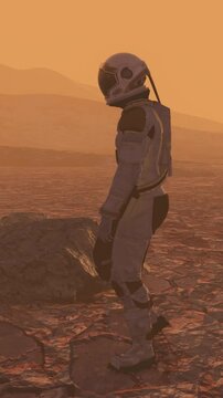 Astronaut wearing space suit walking on the surface of mars. Exploring mission to mars. Red Planet Covered in Gas and Smoke. Futuristic colonization and space exploration concept