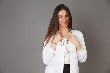 young female doctor - studio background