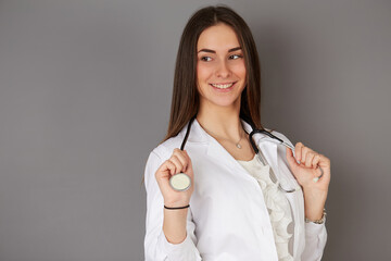 young female doctor - studio background