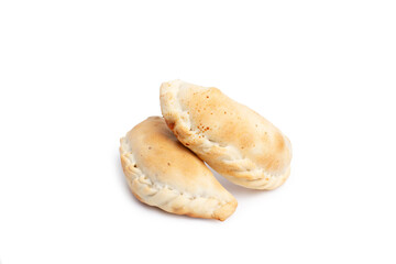 Two argentinian beef empanada isolated on a white background (beef pastry)
