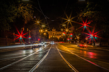Lights of the night traffic in city of Munich, view towards the Maximilianeum, seat of the Bavarian government in Munich