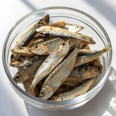 ): Close up of Japanese dried infant sardine used as seasoning in Japanese foods and cooking. Japanese healthy snack food. Niboshi or Iriko fish close.