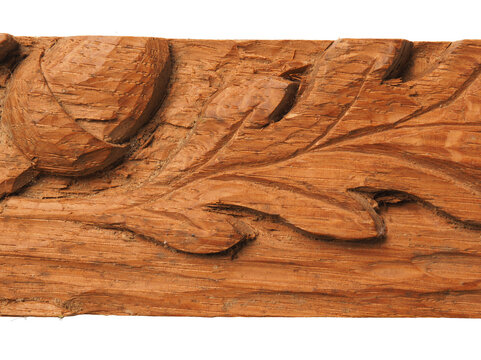 Carving of oak leaves on an old cabinet