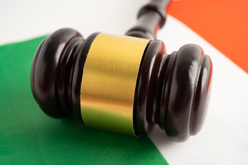 Italy Legal, justice and agreement, wooden court gavel on flag.