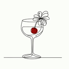 Cocktail glass with cherry and flower