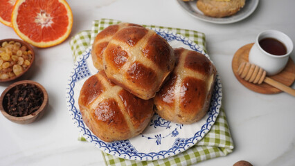 Homemade Zesty Hot Cross Buns Presented in Cozy Atmosphere