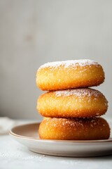 Deliciously Soft and Sweet Powdered Mini Cakes on a Plate