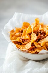 Crispy Fried Chips with Savory Seasoned Meat in a Bowl