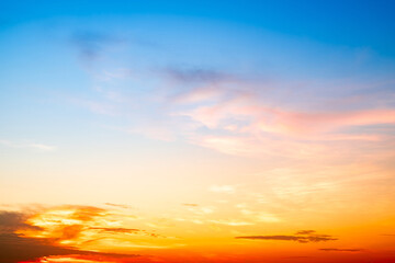 Beautiful , luxury soft gradient orange gold clouds and sunlight on the blue sky perfect for the background, take in evening,Twilight, Large size, high definition landscape photo