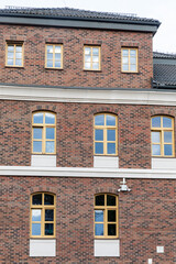 An elevation of a brick house in the Polish Beskid Mountains.